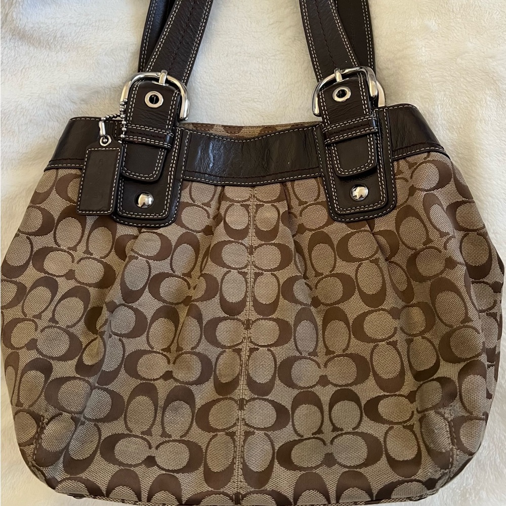 11 inch length 15 inch width. Coach shoulder bag, brown, light brown, tan color